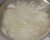 A picture of step 1 of Raw Mango Thecha Pulao.