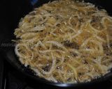 A picture of step 5 of Crispy-colourful fried onions (Persian piaz dagh).