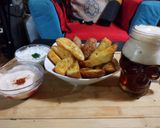 Foto del paso 7 de la receta: Papas Rusty Cage al horno y salsa de yogurt