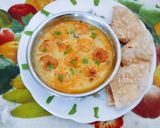 A picture of step 5 of Tasty masaledar Kadhi pakoda with phulka roti for Gujarati dinner.
