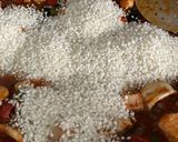 Foto del paso 12 de la receta: Paella de frutos del mar con gambones congelados