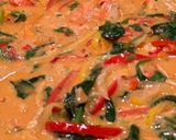 A picture of step 8 of Thai coconut curry with prawns.
