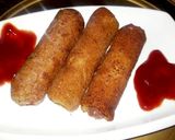A picture of step 5 of Chicken Franks Bread Roll😋👌.