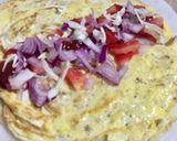 A picture of step 5 of Kolkata egg roll.