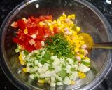 A picture of step 3 of Corn cucumber salad.