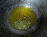 A picture of step 2 of Mushroom Matar curry.