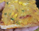 A picture of step 3 of Masala cheese and corn toast.