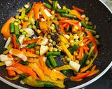 A picture of step 4 of Peri Peri Paneer Steak with Tossed Vegetables.