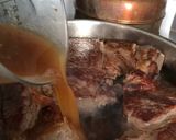 A picture of step 1 of Ridiculously easy Roast beef au jus sandwiches.