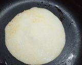 A picture of step 3 of Stuffed rawa utappam.