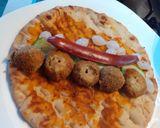A picture of step 2 of Chicken Ball n sausage Pita roll.