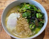 A picture of step 7 of Ramen with stir fried green leeks.