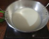 A picture of step 1 of Orange Tapioca Pearls Drink.