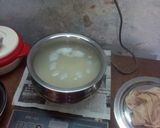 A picture of step 1 of Lemon rice and prawn curry.