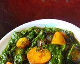 A picture of step 5 of Baby potatoes in green gravy.