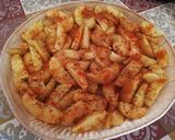 Foto del paso 4 de la receta: Patatas gajo especiadas al horno