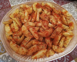 Foto del paso 4 de la receta: Patatas gajo especiadas al horno