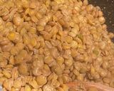 A picture of step 3 of Mdardara - brown lentils and rice with fried onions.