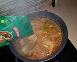 Foto del paso 12 de la receta Arroz caldoso de pollo y conejo