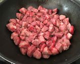 Foto del paso 6 de la receta: Setas salteadas con castañuelas de cerdo, jamón y ajo negro
