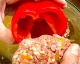 A picture of step 3 of Easy Creamy Tomato Sauce Stuffed Bell Peppers with Meat and Rice by TastyPinch.