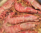 Foto del paso 2 de la receta: Arroz integral con conejo y gambones