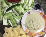 A picture of step 1 of Jhinge Posto / Ridge Gourd in Poppy Mustard Sauce.