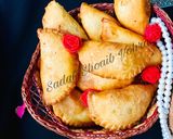 A picture of step 5 of Meethay samosay  /Gujiya /Sweet (honey) half moon.