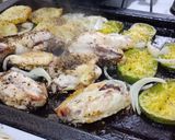 Foto del paso 2 de la receta: Pollo al horno con papas y zapallitos