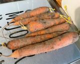 Une image de l'étape 1 de Poulet aux cacahuètes, carottes, tomates et épices.