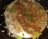 A picture of step 3 of Anda Bhurji.