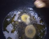 A picture of step 2 of Crispy onion rings pakorey.