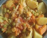A picture of step 2 of Aloo kurma curry with vegetables.