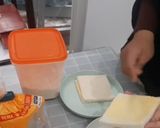 Foto langkah ke 1 dari resep Roti Manis Panggang Isi Keju Melt.