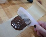 Foto del paso 3 de la receta: *Aguacate relleno en alas de Chocolate*