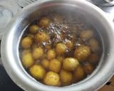 A picture of step 1 of Baby Potatoes Sabzi.