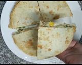 A picture of step 10 of Breakfast quesadilla||Stuffed Tortilla||Tortilla egg and cheese.