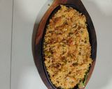 A picture of step 8 of Schezwan fried rice sizzler.