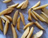 Spicy Cajun chicken with potato wedges and buttered corn recipe step 1 photo