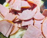 A picture of step 2 of Eggs with Canadian Bacon.