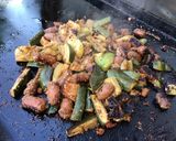 Une image de l'étape 7 de Courgettes aux merguez,tomate et épices.