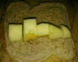 Foto del paso 4 de la receta: Arrolladitos rellenos de manzana, cubiertos de canela y azúcar