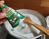 Foto langkah ke 2 dari resep 25. Bubur Gurih Sederhana with Santan Kara.