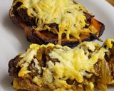A picture of step 10 of Curried potato filled peppers with cheese.