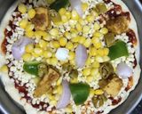 A picture of step 4 of Corn Paneer pizza.
