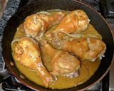 A picture of step 10 of Curry Drumsticks.
