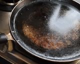 A picture of step 6 of Besan onion tomato chilla.