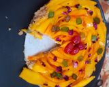 A picture of step 11 of Mango flower tart.