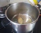 A picture of step 1 of Ringna vatana bateta ni khichdi and kadhi.