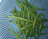 A picture of step 1 of Beans Poriyal.